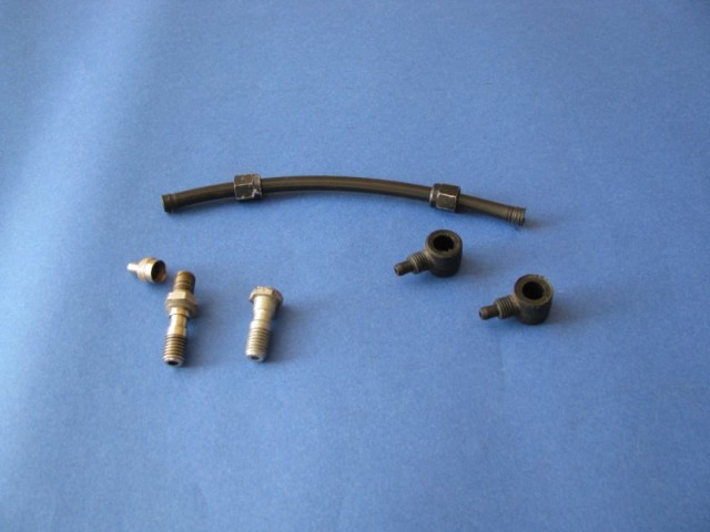 Système d'équilibrage de pression
Valve permettant d'avoir la mÃªme pression dans chaque tube de la fourche.

