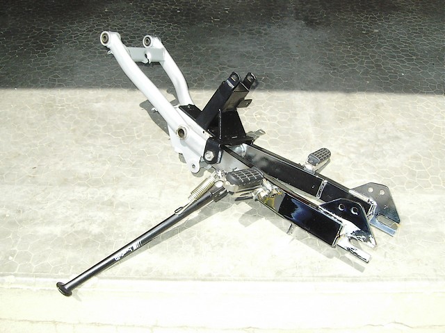 Bras oscillant Buzzetti
